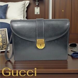 Gucci Black Leather Clutch with Gold Lock